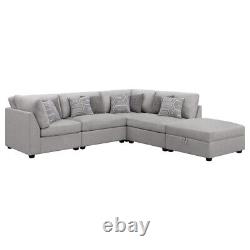 Ensemble de meubles de salon modulable en polyester gris comprenant un canapé sectionnel et un ottoman de 5 pièces.